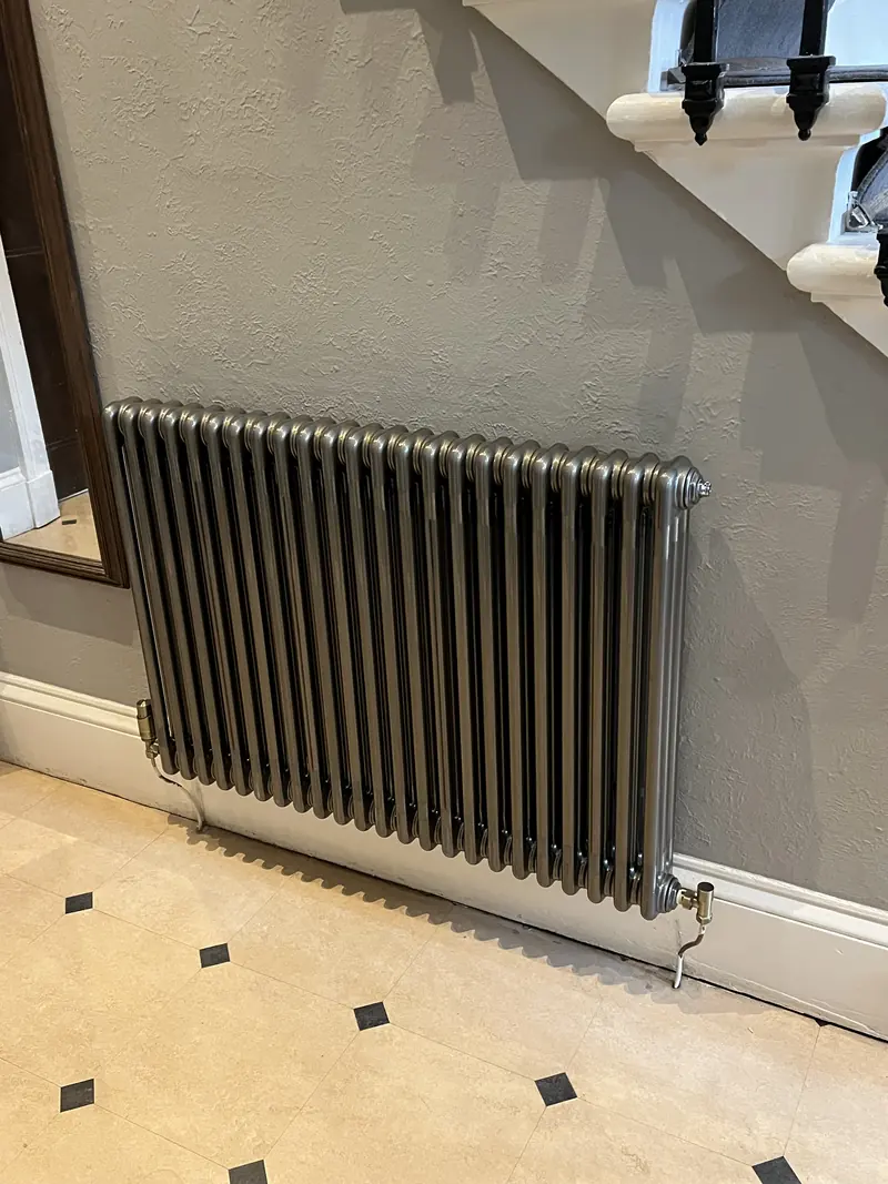 Column radiator installed in an Edinburgh hallway by RRG Plumbing