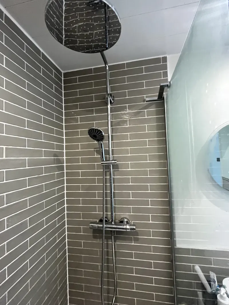 Rainfall shower and thermostatic bar mixer installed by RRG Plumbing